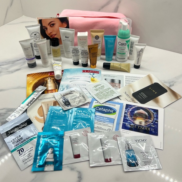 Bobbie Brown Other - 35 Piece skincare set Peter Thomas Roth / Clarins / Bobbie Brown w/ Pink bag